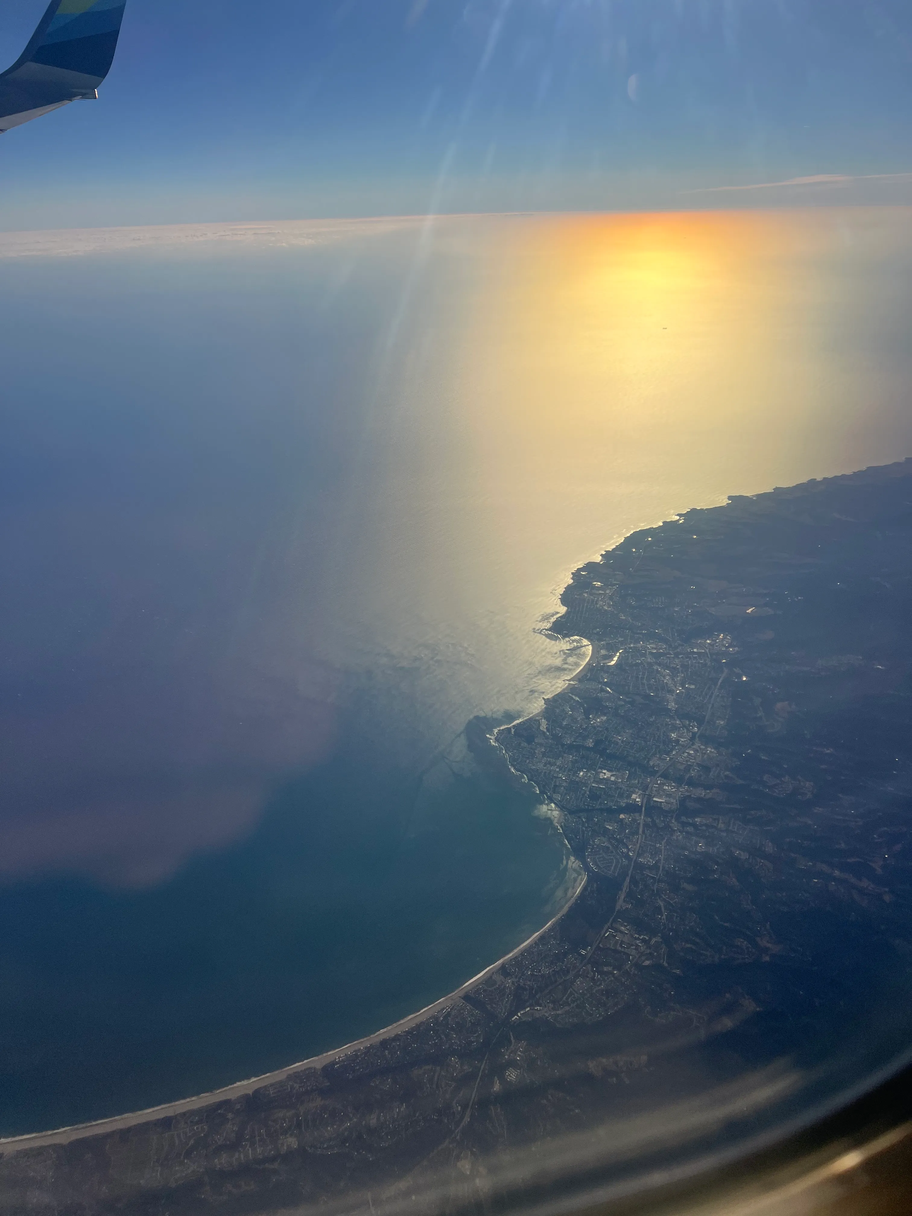 The California coastline seen from a plane window.