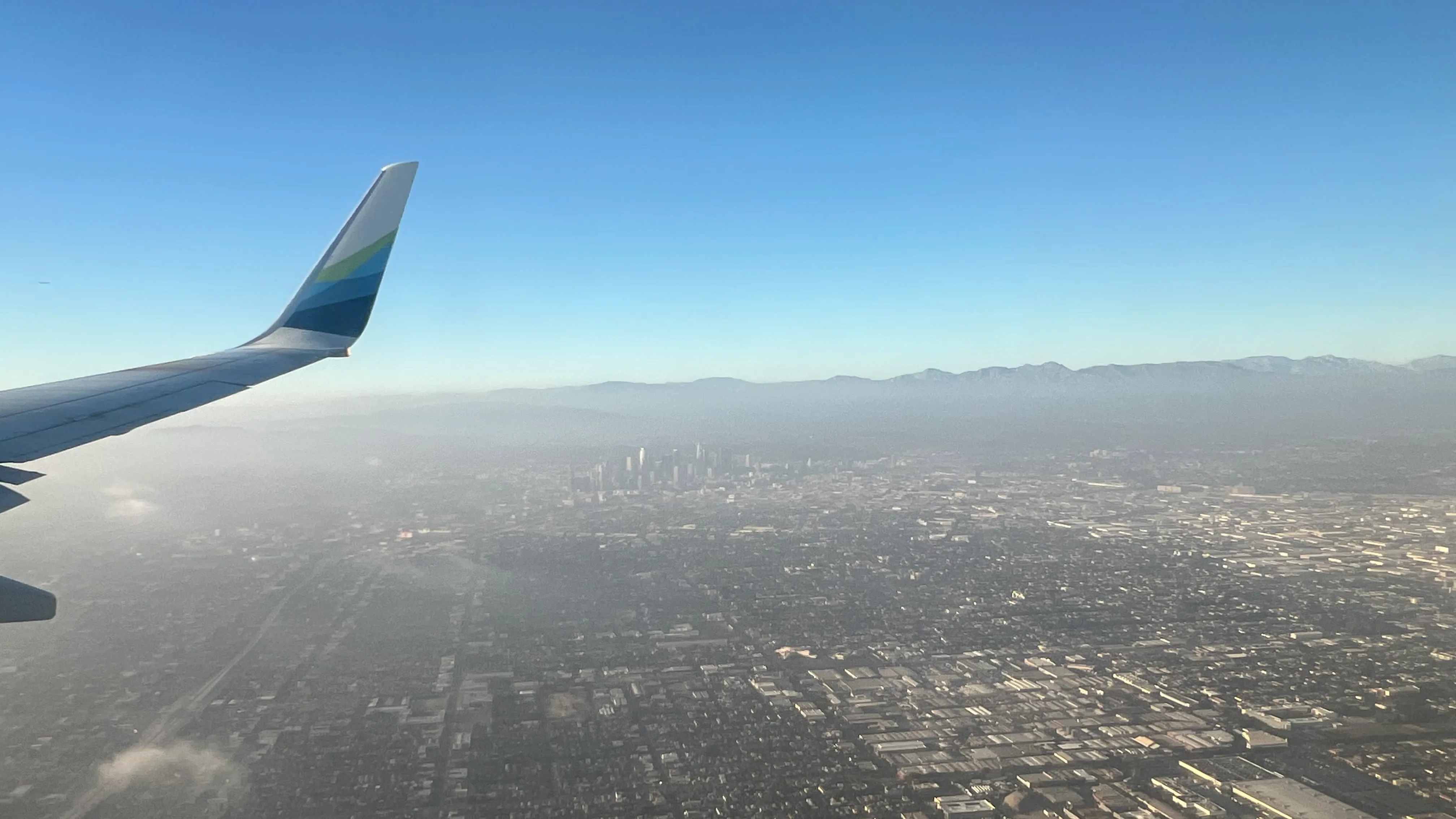 Los Angeles spread out below a plane window.